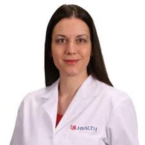 Dr. Savitti Fermin headshot